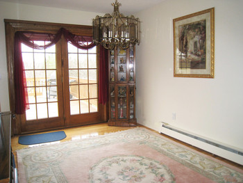 with wide doors that open to the deck